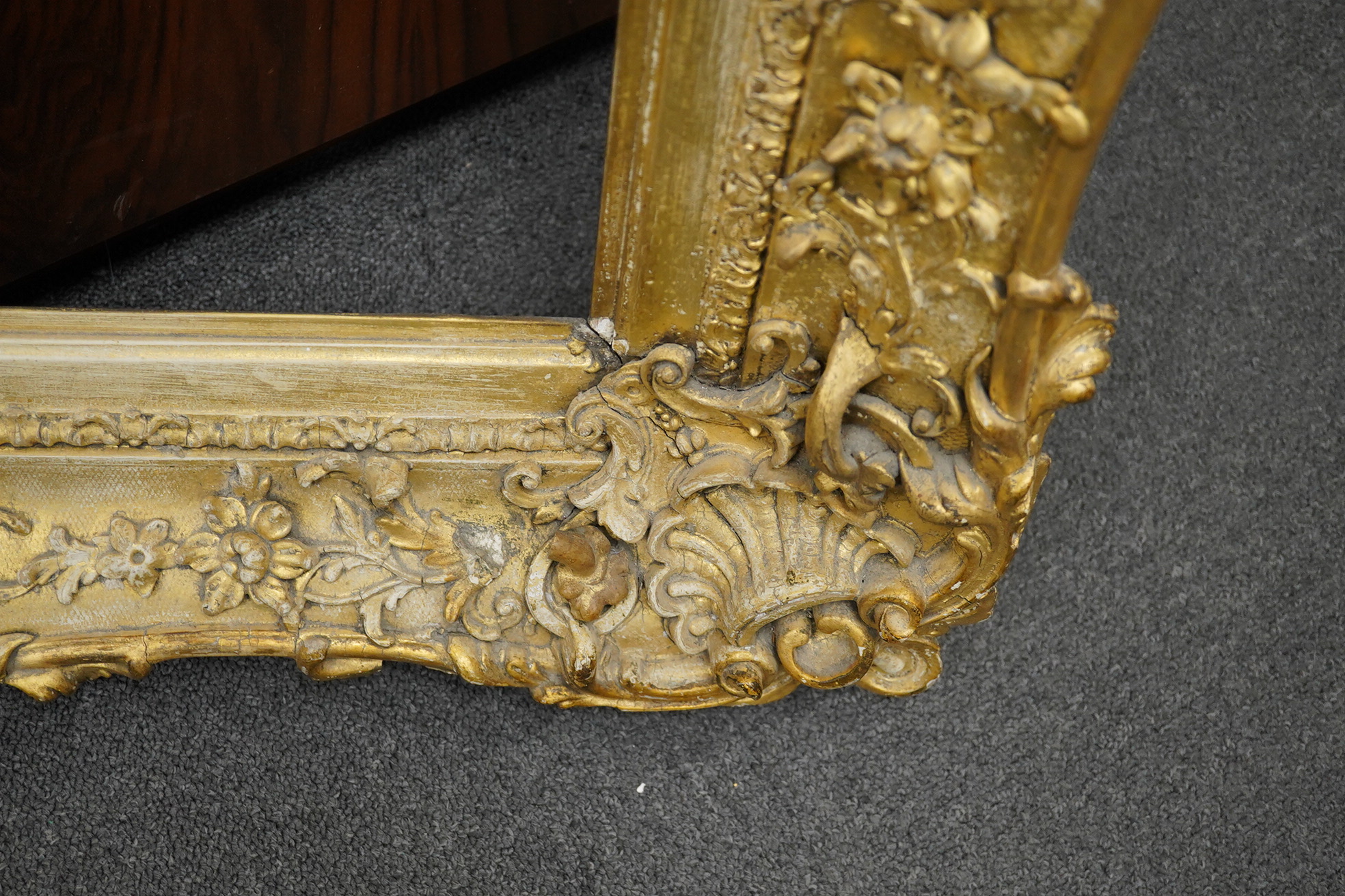 A 19th century ornate gilt picture frame, aperture size 74 x 60cm. Condition - fair, minor losses